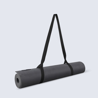 Rolled-up TRNR Hero Mat in Black Wash Colour and 4 mm Thickness | Featuring Black Carry Strap