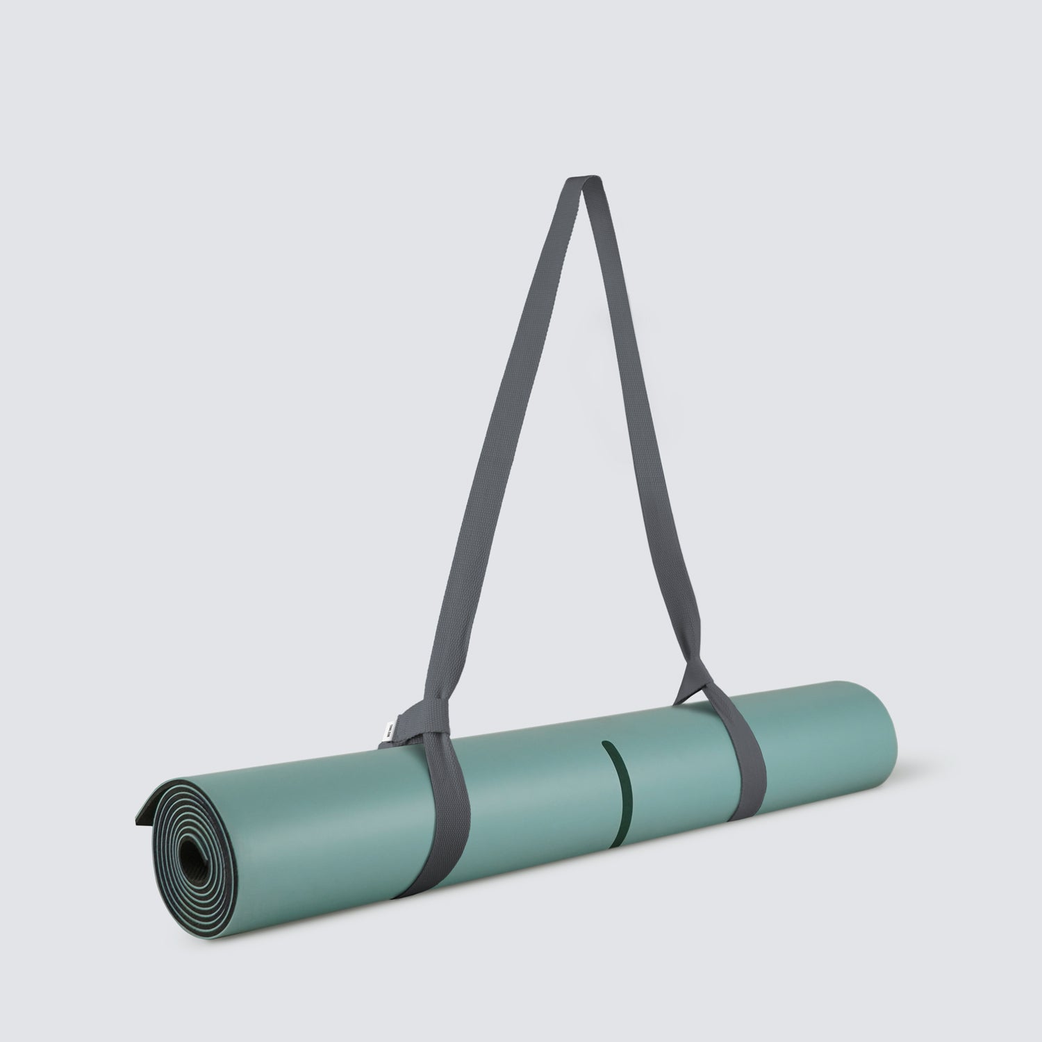 Rolled-up TRNR Fusion Mat in Mint Colour and 4 mm Thickness | Featuring Grey Carry Strap