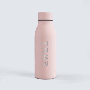TRNR Bliss Bottle (Blush Pink) in 600 ml capacity | Product Overview Featuring TRNR Logo and Powder-Coated Finish
