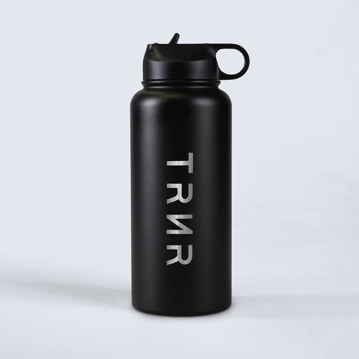 TRNR Sports Bottle (Black) in 946 ml capacity | Product Overview Featuring TRNR Logo and Flip Spout with Handle