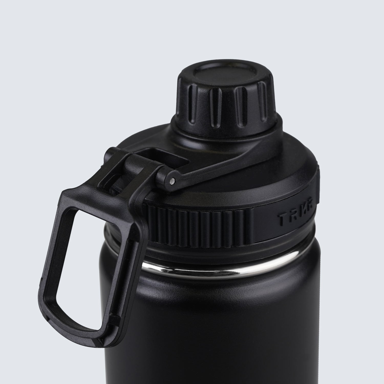 TRNR Studio Bottle 7100 ml capacity (Black) |  Lid Photo Featuring Easy-Grip Handle and Screw Top