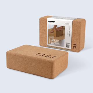 TRNR Cork Yoga Block Alongside Packaging