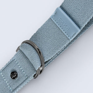 Close-Up on the TRNR Stretching Strap in Celestial Blue and its Hardware and Branding details