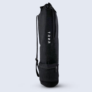 TRNR Studio Carry Sack in Black Featuring Drawstring Closure, Shoulder Strap, and Small Zipper Pocket