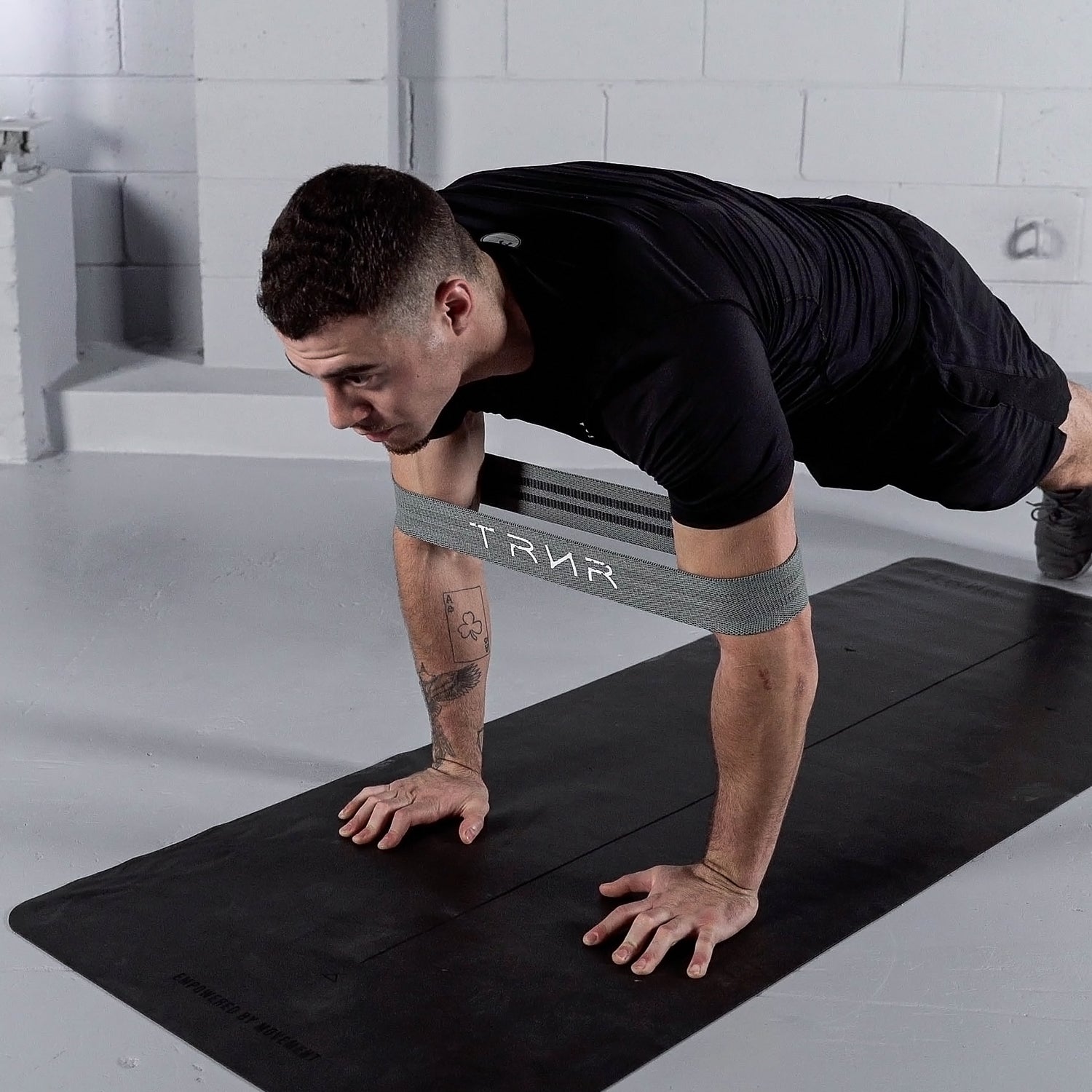 Resisted Push-Ups with a TRNR Squat Band