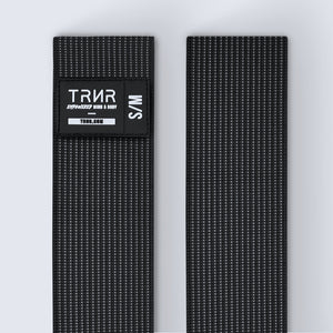TRNR Stretch Band S/M | Close-Up of Webbing and Label
