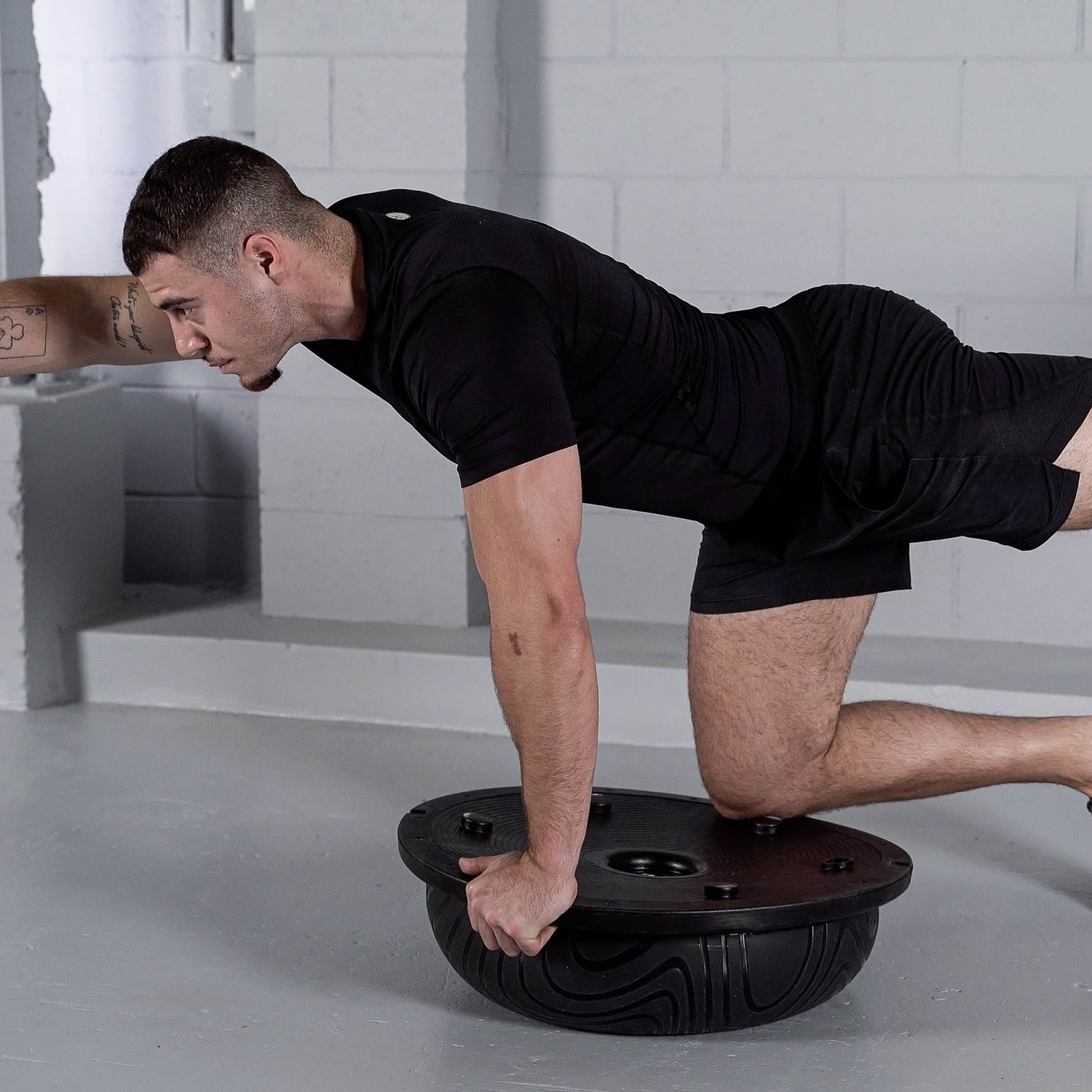 Yoga-Inspired Balance Exercise on Underside of TRNR Balance Trainer